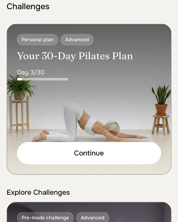 Challenges screen with a 30-day Pilates plan at day 3 of 30 and a pre-made challenge below